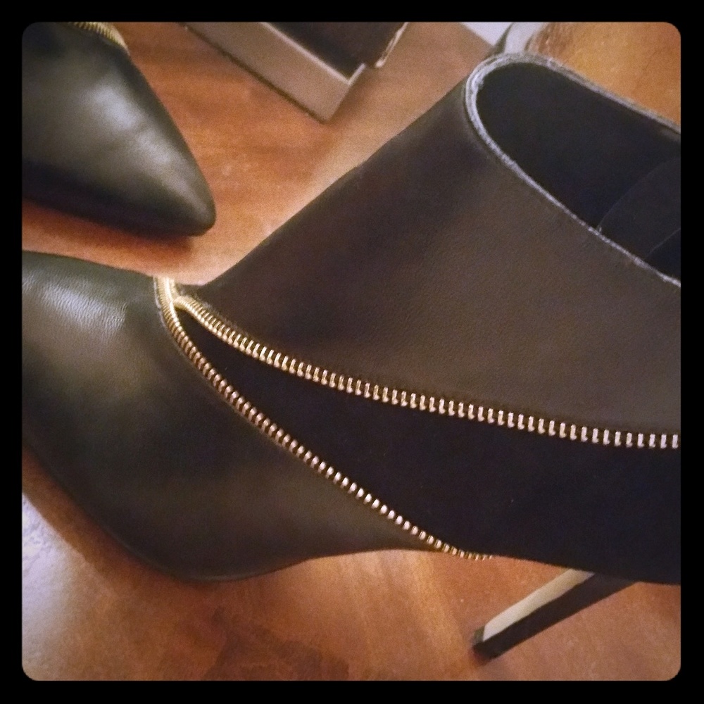 Schultz brand ankle heeled boots with gold zipper